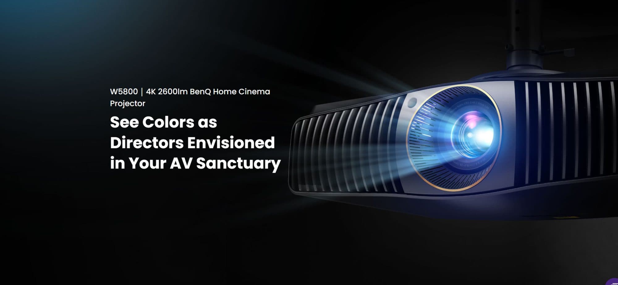 BenQ home theatre projector set up in a living room for movie viewing