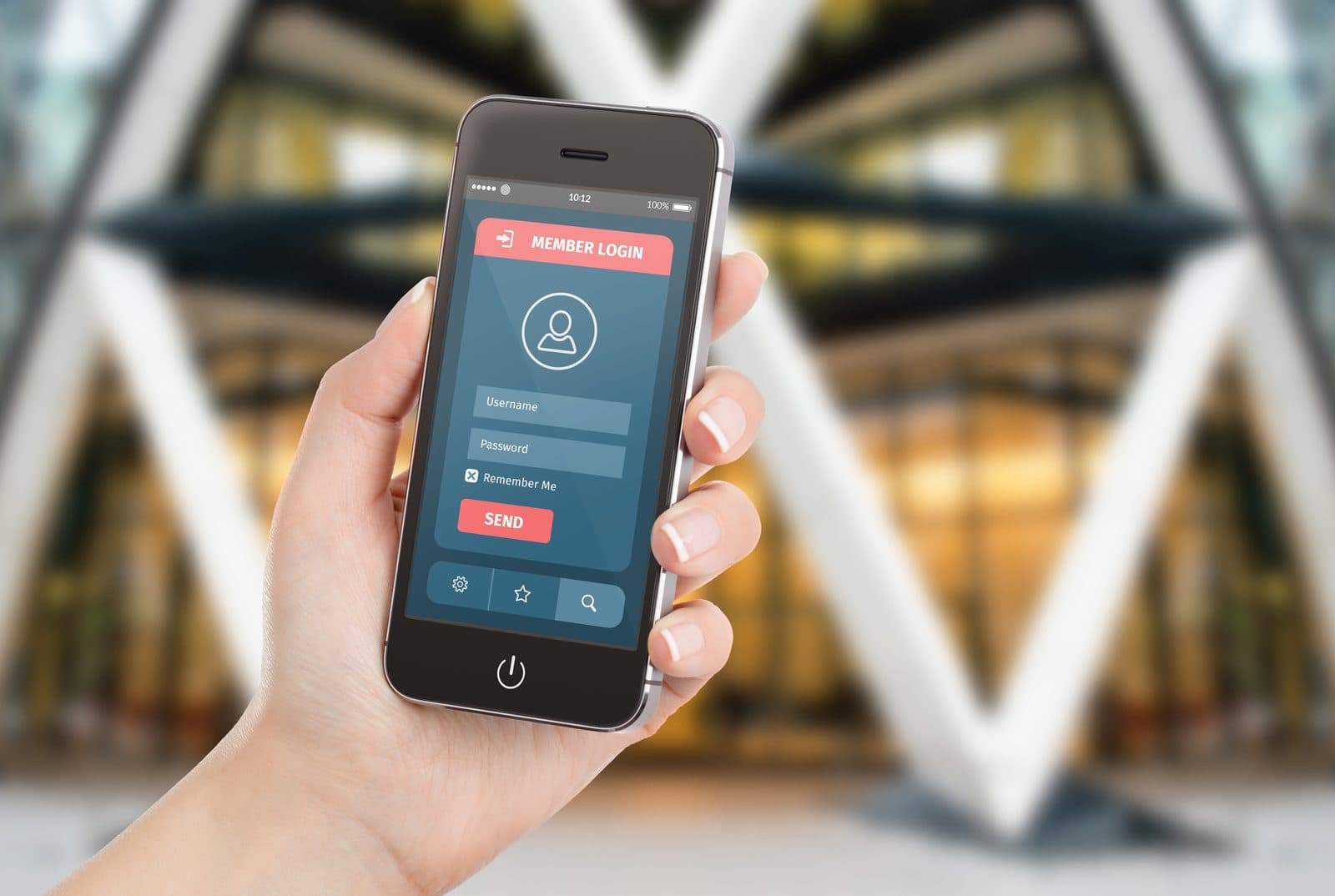 Employee using a biometric fingerprint device to mark office attendance